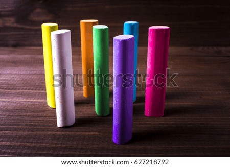 colorful chalk color sticks on wood