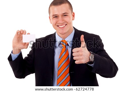 Business man giving thumbs up for the card he is holding