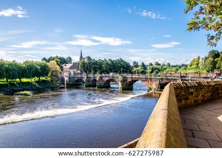 The view of Dee river and Old Dee Bridge taken from the old town Royalty-Free Stock Photo #627275987
