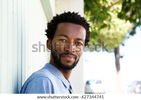 Close up portrait of serious african american man staring