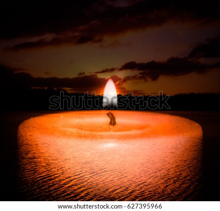 A digitally manipulated photograph of Lake Kurwongbah with a burning candle overlay.
