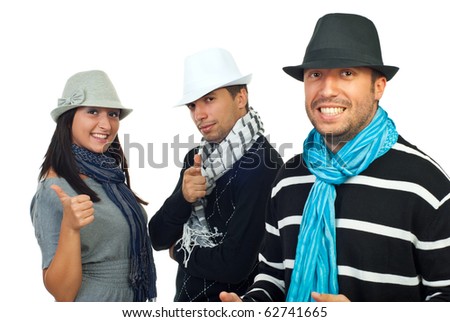 Cheerful elegant friends in hats and scarves isolated on white background