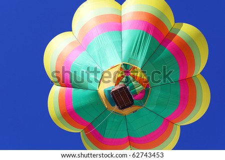 Hot air balloon on blue sky background