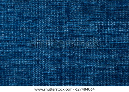 Closeup dark blue yarn textile background and textured