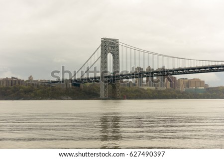 George Washington Bridge crossing the Hudson River on a overcast cloudy day from Fort Lee, New Jersey.