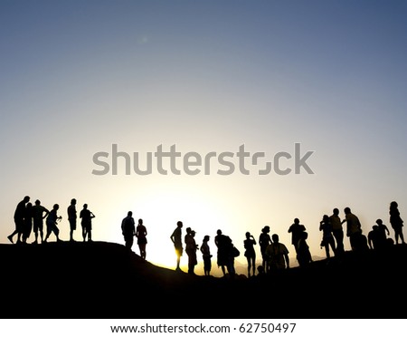 Group of people on top of a mountain in the sinai desert, northern egypt