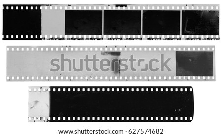 Old, used, dusty and scratched black and white celluloid film strips isolated on white background
