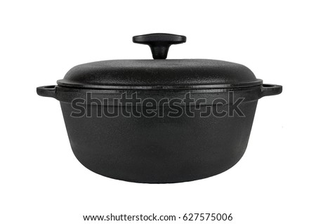 Cast iron pan,  cast iron pot with lid, black. From the side. Royalty-Free Stock Photo #627575006