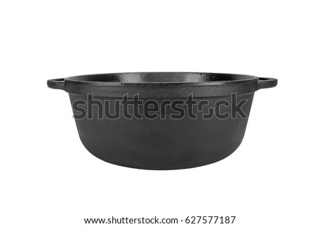Cast iron pan,  cast iron pot, empty, black. From the side. Royalty-Free Stock Photo #627577187