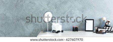 Panoramic view of room with grey wall and makeup table