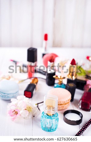 Decorative cosmetics and perfume. Isolated on white