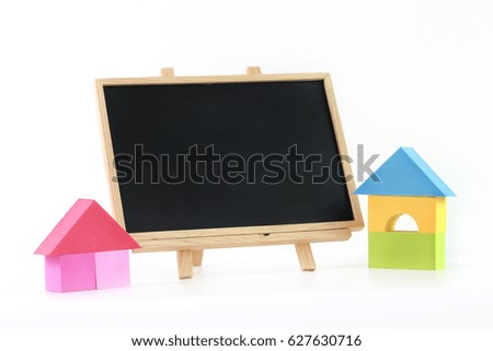 Concept of building, mortgage, investment, real estate and property - Blank chalk board with house model and car