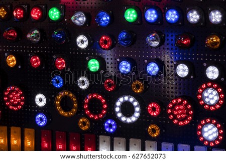 Abstract background of halogen multicolored plastic light bulbs