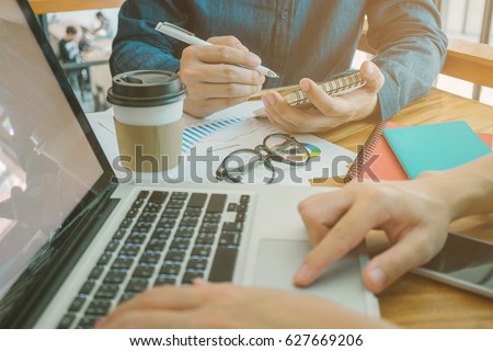 Male creative designer writing business plan at workplace Royalty-Free Stock Photo #627669206