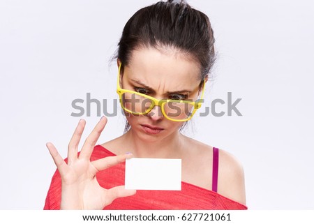      upset woman with bussines card