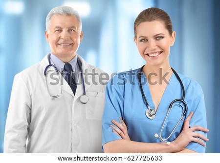 Medical staff on blurred hospital background