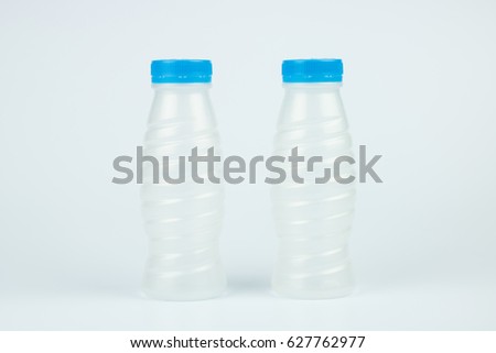 plastic empty dottle on white background