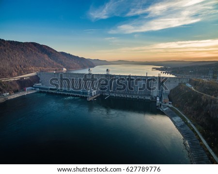 View from height on hydroelectric power station in Russia, Siberia, Krasnoyarsk, a decline, shooting from air Royalty-Free Stock Photo #627789776