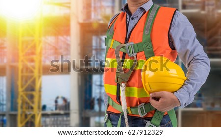 engineer wear fall arrest equipment on site  background Royalty-Free Stock Photo #627912329
