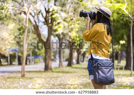 Traveller woman taking photo, Concept of travelling