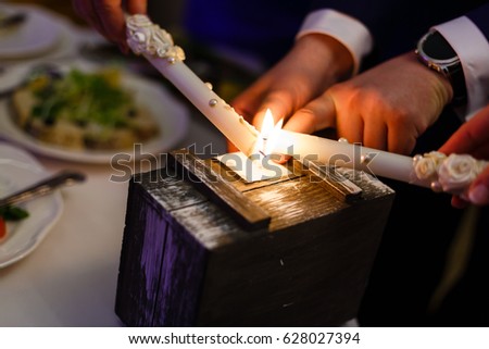 Two advent lights burning Two burning candles Wooden box
