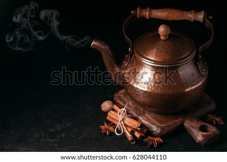 Copper tea pot and masala ingredients