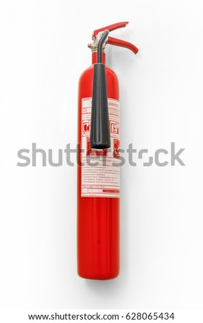 A fire extinguisher hanging vertically on the wall. White background. For photomontage and collage.