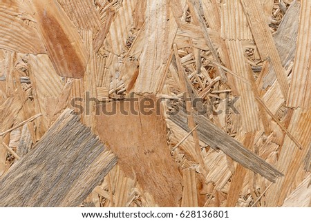 Wood texture with natural pattern. Plywood texture with scratches for background and design. OSB - Pressed wooden panel background, seamless texture of oriented strand board
