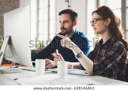 Software engineers working on project and programming in company Royalty-Free Stock Photo #628146863