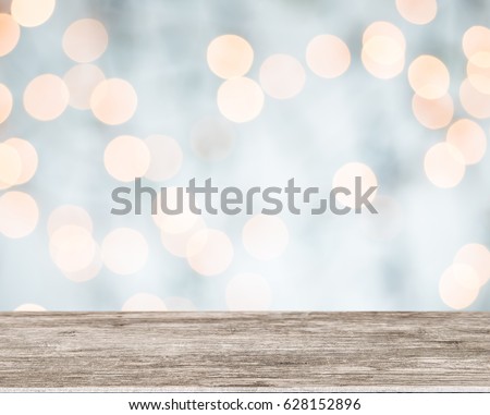 Empty wooden perspective platform with sparkling abstract blur bokeh used as template to mock up for display product