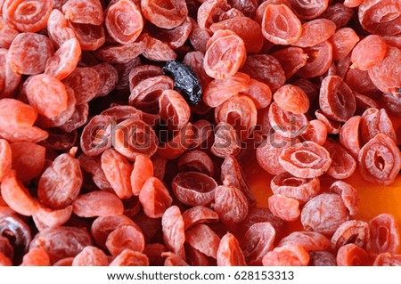 Dried fruits sold in flea. Partially coated with a salt or sugar in the drying process to prolong its expired date.
