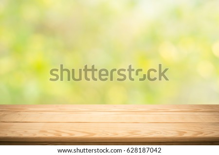 table top on green blurred  background,Space for placing products