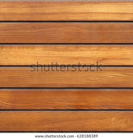 Wooden surface is brown color. Background texture.