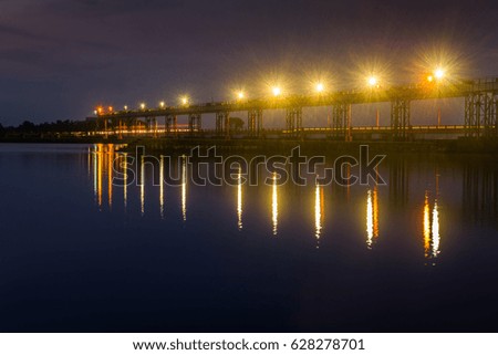 Beautiful Lights of Bridge Reflects on Water 