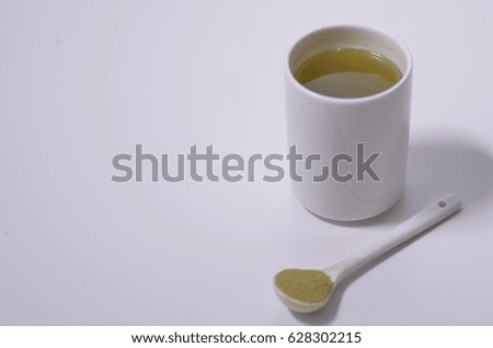 the image of a glass of green tea. stay on left and right in picture.
clean and minimal image and smooth.