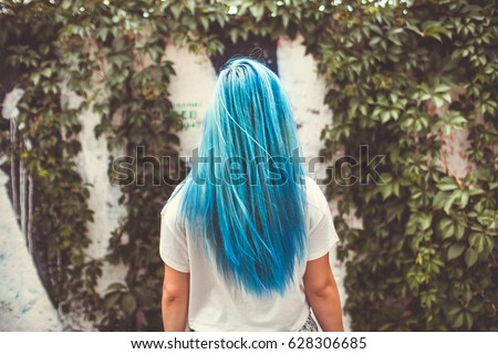 girl with blue hair Royalty-Free Stock Photo #628306685