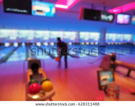 Blurred image of bowling arena bokeh. Concept for blur background, competition, hobby, team, defocus