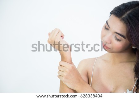 Young asian woman sore wrist, Young asian lady boy has inflammation and swelling cause a pain the sore wrist, isolated on white background, Painful Concept