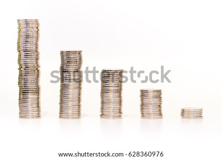 coins stacks over white background economic growth drop concept abstract photo