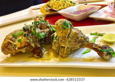 Afghani chicken Royalty-Free Stock Photo #628513337