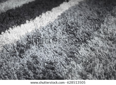 A horizontally striped carpet texture. This photo was taken in Brisbane, Australia. 