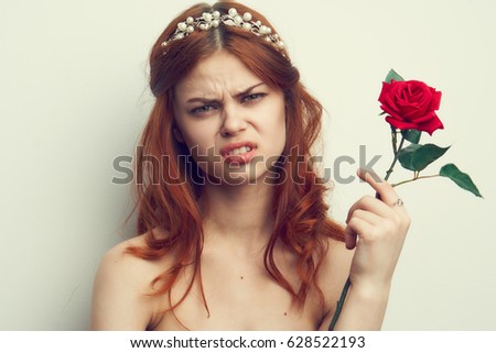 Dissatisfied woman with an allergy to flowers
