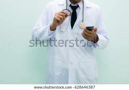 Medicine doctor working with his smart phone on white background