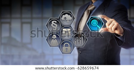 Blue chip enterprise governance officer tweaking a virtual magnifier icon between thumb and index finger. Business concept for regulatory compliance, government regulations, corporate transparency. Royalty-Free Stock Photo #628659674