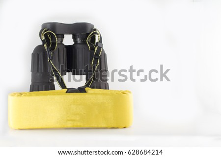 Binocular with yellow floating strap