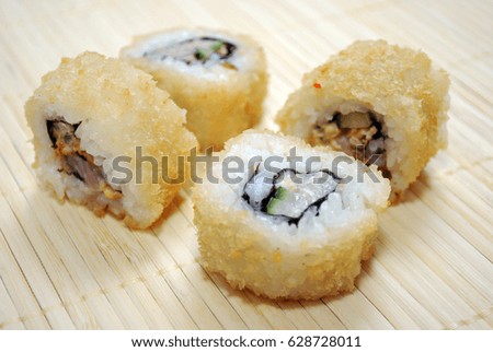 Japanese cuisine. Fried beaters in breadcrumbs. Shrimp tempura beater