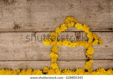Composition with yellow flowers, house cottage, children's work                          