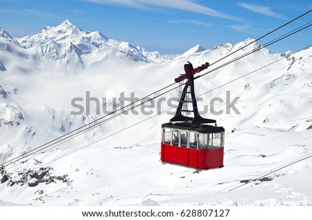 Cable car cabin at beautiful slopes of the Caucasus Mountains, Elbrus Royalty-Free Stock Photo #628807127