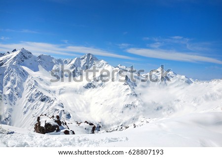 Landscape of beautiful slopes of the Caucasus Mountains, Elbrus Royalty-Free Stock Photo #628807193