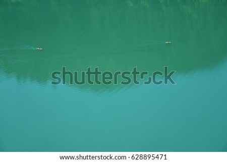 Two Kayaks in a Calm Diablo Lake in the North Cascades